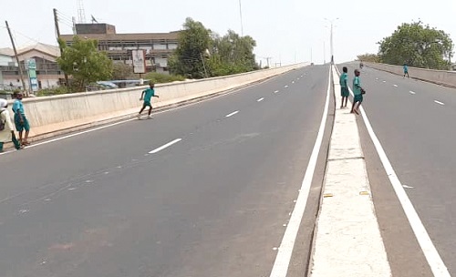 Children turn Tamale flyover into playground