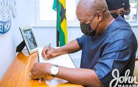 Mr John Dramani Mahama Signing The Book Of Condolence