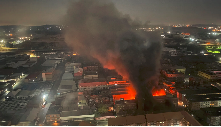 At least 73 dead after fire tears through building used as temporary housing in South Africa