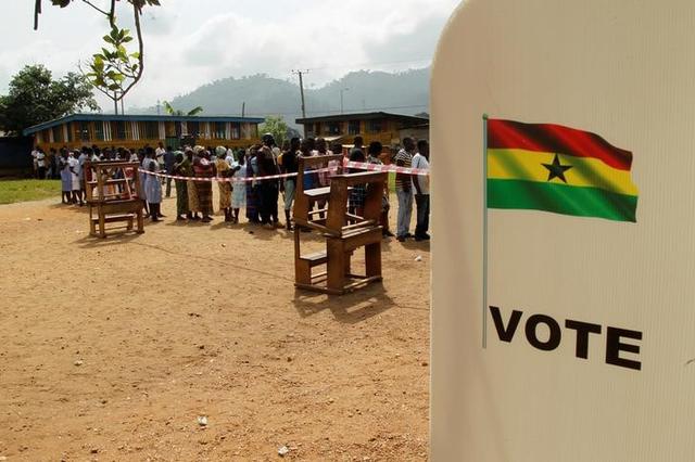 People wait to vote at a polling station in Kibi, eastern region of Ghana December 7, 2016. REUTERS/Luc Gnago