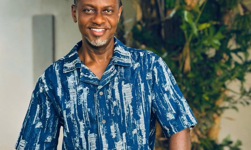 Israel Laryea beams with pride as son returns from US with special gift